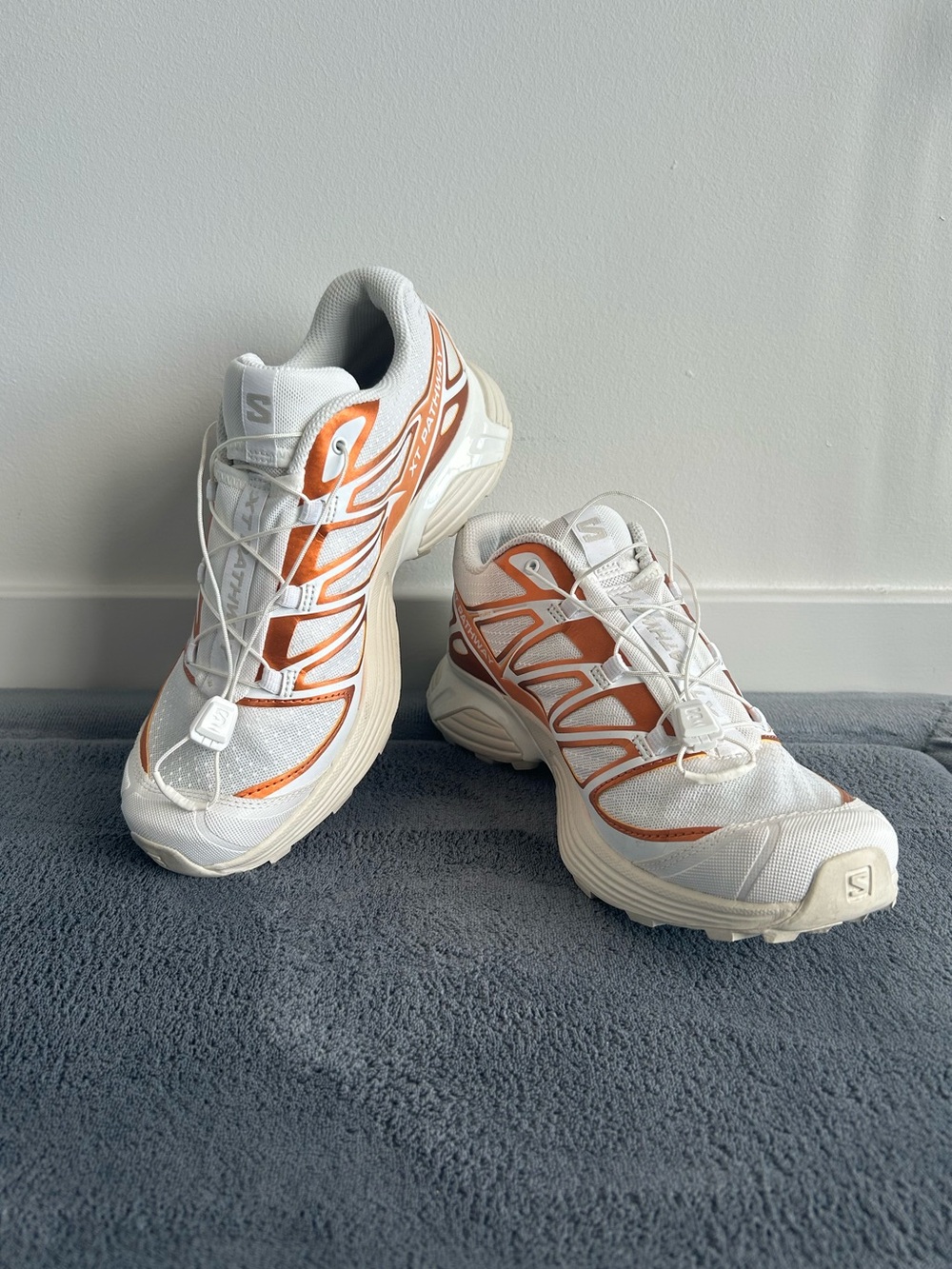 Salomon Women’s White and Orange Trail Sneakers